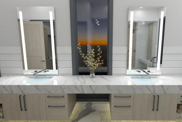 Primary bathroom vanity with led mirrors and an integrated sink countertop.