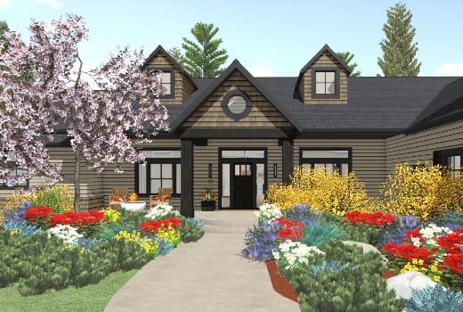 The front of a home with flower beds on either side.