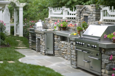 Barbeque and cooking station built into a rock wall