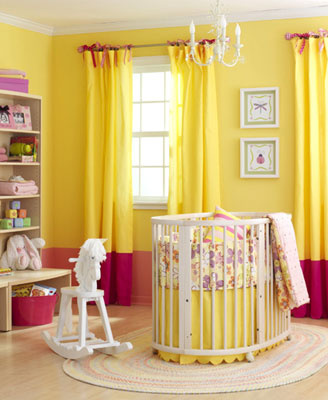 A yellow nursery with red accent colors