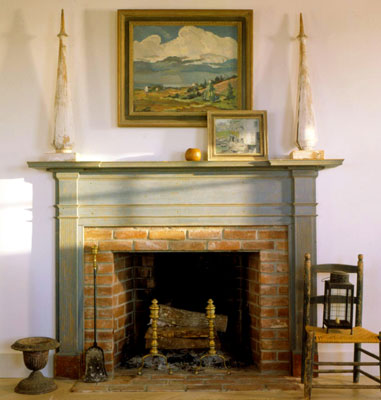 A traditional country style fireplace made out of brick