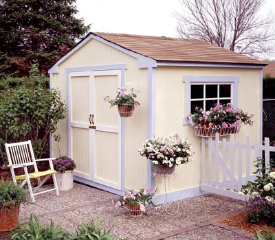 Exterior view of a shed surrounded by plants