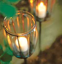 Close-up of candles on stands