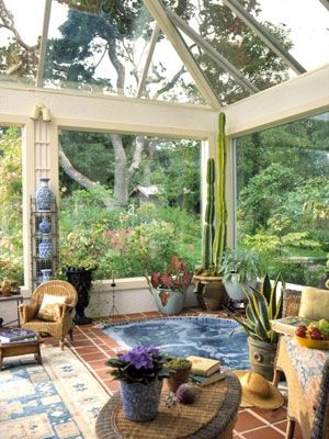 A conservatory looking out into the back yard