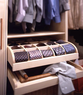 A small roll-out cubby for ties