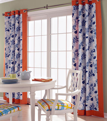 Orange and blue curtains over a slider